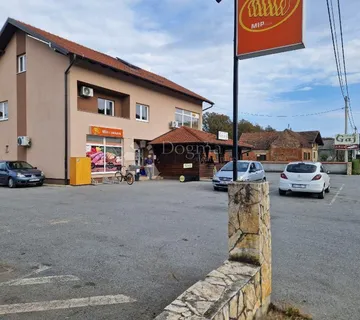 Kuća s poslovnim prostorima i dodatnim zemljištem - odlična vidljivost i potencijal - cover
