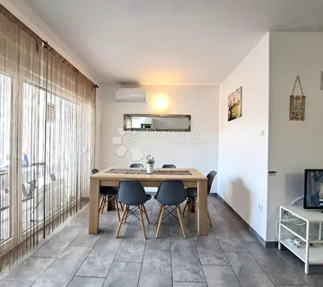 Novi stan s terasom, privatnim vrtom i parkirnim mjestom - cover