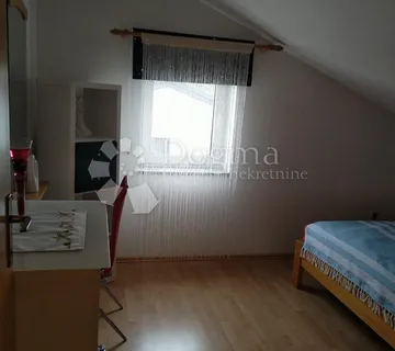 OTOK KRK-Kuća s tri stambene jedinice i garažom - cover