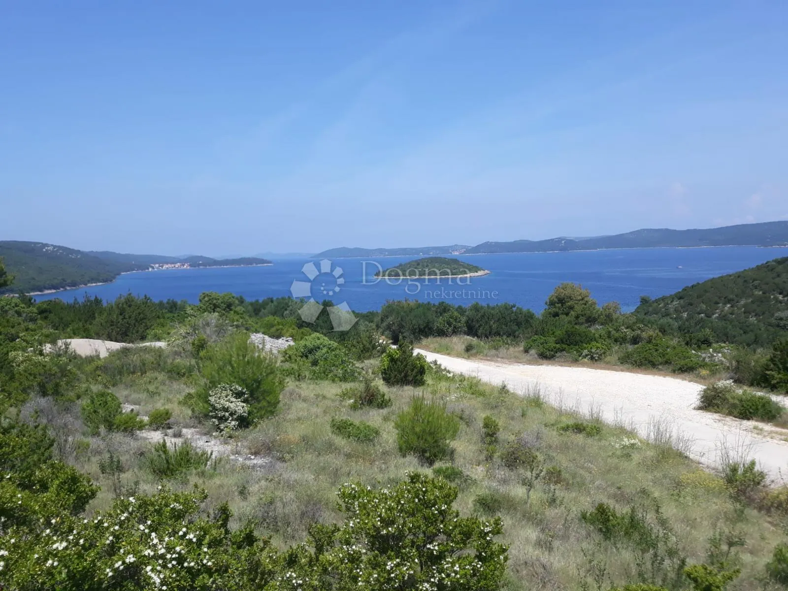 DUGI OTOK - GRAĐEVINSKO ZEMLJIŠTE S POGLEDOM NA MORE 1633m2 - cover