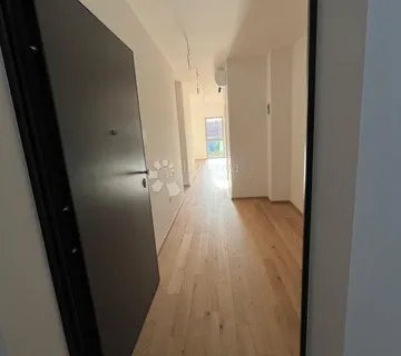 MODERAN ČETVEROSOBAN STAN-NOVOGRADNJA!! - cover