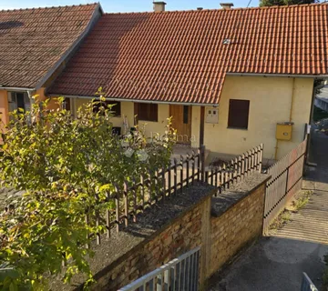 Idealna za obitelj ili ulaganje – kuća s okućnicom na Dunavu - cover