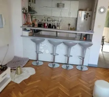 Pametna investicija u srcu Osijeka – stabilan prihod, vrhunska lokacija i mogućnost života pod istim krovom! - cover