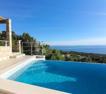 Kamena kuća s bazenom i pogledom na more - cover