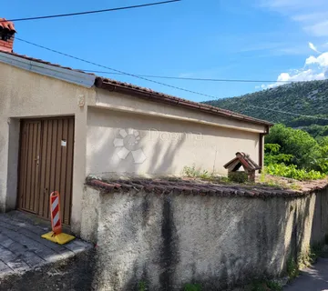 Kuća sa garažom - cover