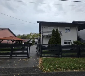 Prostrana kuća s dvije stambene jedinice i velikom parcelom - cover