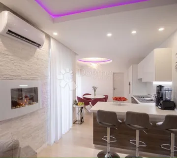 Luksuzni stan sa wellnessom i garažom - cover