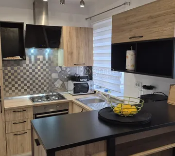 Dvoetažni stan površine 91,05 m2 u Balama - cover