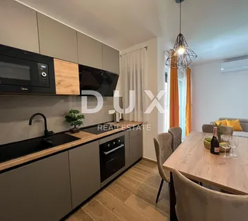 OTOK PAG, NOVALJA - luksuzni apartman u kućicama u nizu NOVOGRADNJA