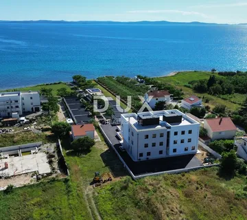 ZADAR, PRIVLAKA - Ekskluzivna Prilika za Luksuzan Život Uz Plažu u Modernoj Novogradnji! S2