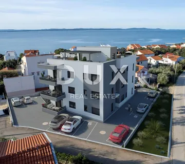 ZADAR, PETRČANE - Prostrani stan s vrtom u izgradnji 150 m od mora - Petrčane, Zadar