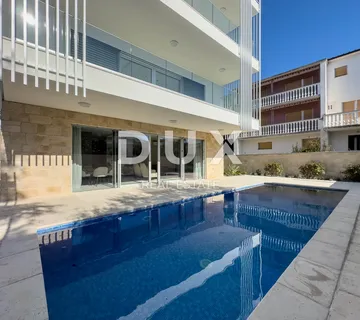 GRAD KRK - CENTAR - NOVOGRADNJA - Prizemlje s terasom i 2 parkirna mjesta - cover