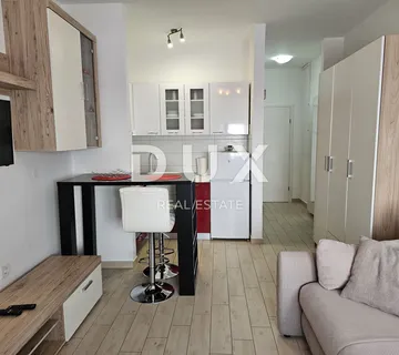 OTOK RAB, PALIT - Garsonijera u centru - cover