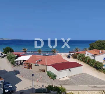  OTOK PAG, POVLJANA - Prekrasan stan u Povljani, korak od plaže s terasom koja nudi spektakularan pogled na more !  - cover