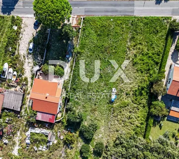 OTOK RAB, BANJOL - Građevinsko zemljište na odličnoj lokaciji 200m od mora - cover