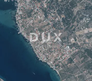 OTOK RAB, BARBAT - Građevinsko zemljište 512m2 s pogledom na more - cover