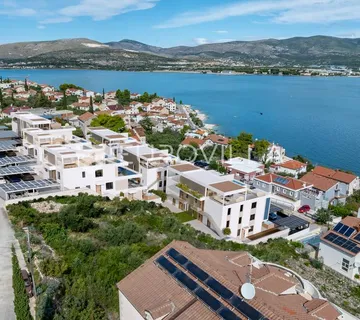 Trogir, Čiovo, dvosoban stan s vrtom u ekskluzivnom naselju - cover