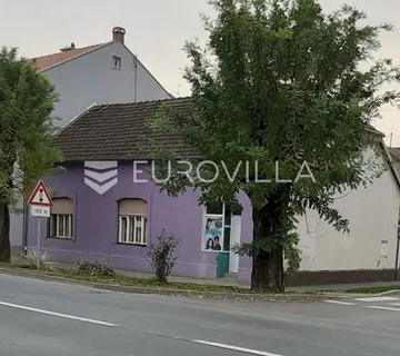 Vukovar, širi centar, kuća na uglu s poslovnim prostorom, parcela 450 m² - cover