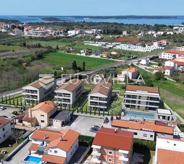 Istra, Fažana, luksuzni četverosobni stan 94.14 m², 1. kat, 1.2 km od mora, zatvoreni kompleks