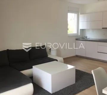 Pag, Novalja, moderni trosobni stan 80m2 u prizemlju, novogradnja