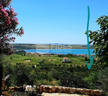 Ljubač, građevinsko zemljište, 1117 m2 - panoramski pogled na more - cover