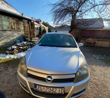 Opel Astra H - cover