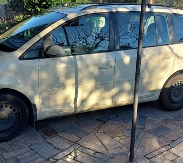 VW Touran 1.9tdi - cover