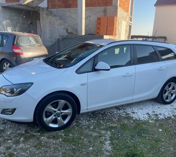 Opel Astra J 2.0CDTI SportTourer Automatic - cover
