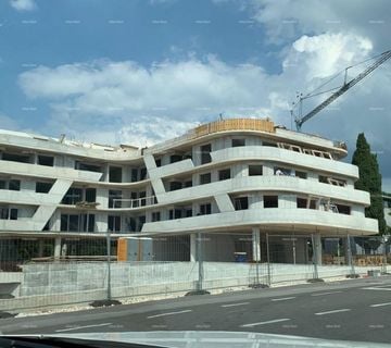Poreč, stambeno poslovni objekt u gradnji sa apartmanima i podzemnim g - cover