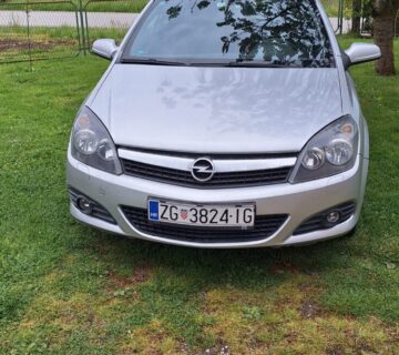 Opel astra gtc - cover