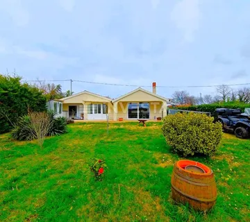 Kuća s okućnicom u mirnoj okolini - cover