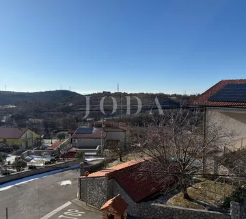 Buzdohanj dvosobni stan u novijoj zgradi - cover