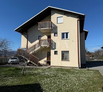 Dvojna kuća s poslovnim prostorom i garažom - cover