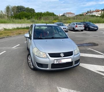 Suzuki SX4 - cover