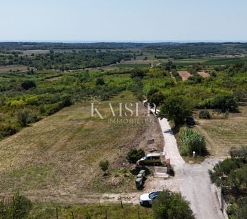 Istra, Buje - građevinsko zemljište, 1032m2, top lokacija - cover