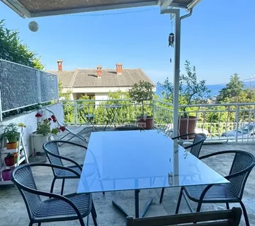 Stan u Opatiji s terasom i parkirnim mjestima - cover