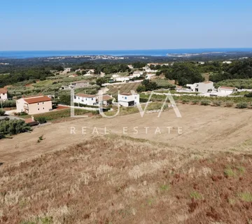 Kaštelir, Novigrad, građevinsko zemljište s dozvolom, 1011 m2 - Valentići, Kaštelir - Labinci