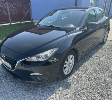 Mazda 3 Sport 2,0 i - cover