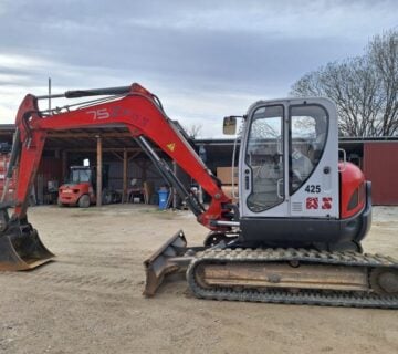 Mini bager Wacker Neuson težine 7500 kg. God.pr 2008 - cover