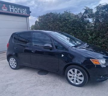 Mitsubishi Colt 1,3 MOTION EDITION KLI.A POCINyČAN KARTICE DO 36 MJ - cover