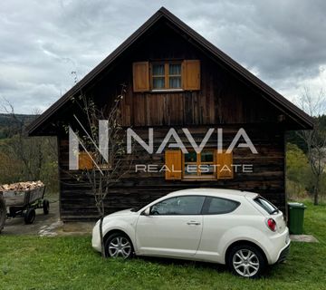 Zemljište s dva objekta u zelenilu - cover