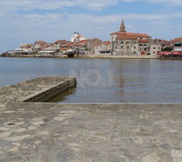 Umag, Bašanija - građevinsko zemljište 700 m od mora - cover