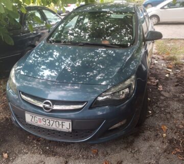 Opel Astra Sport Tourer - cover