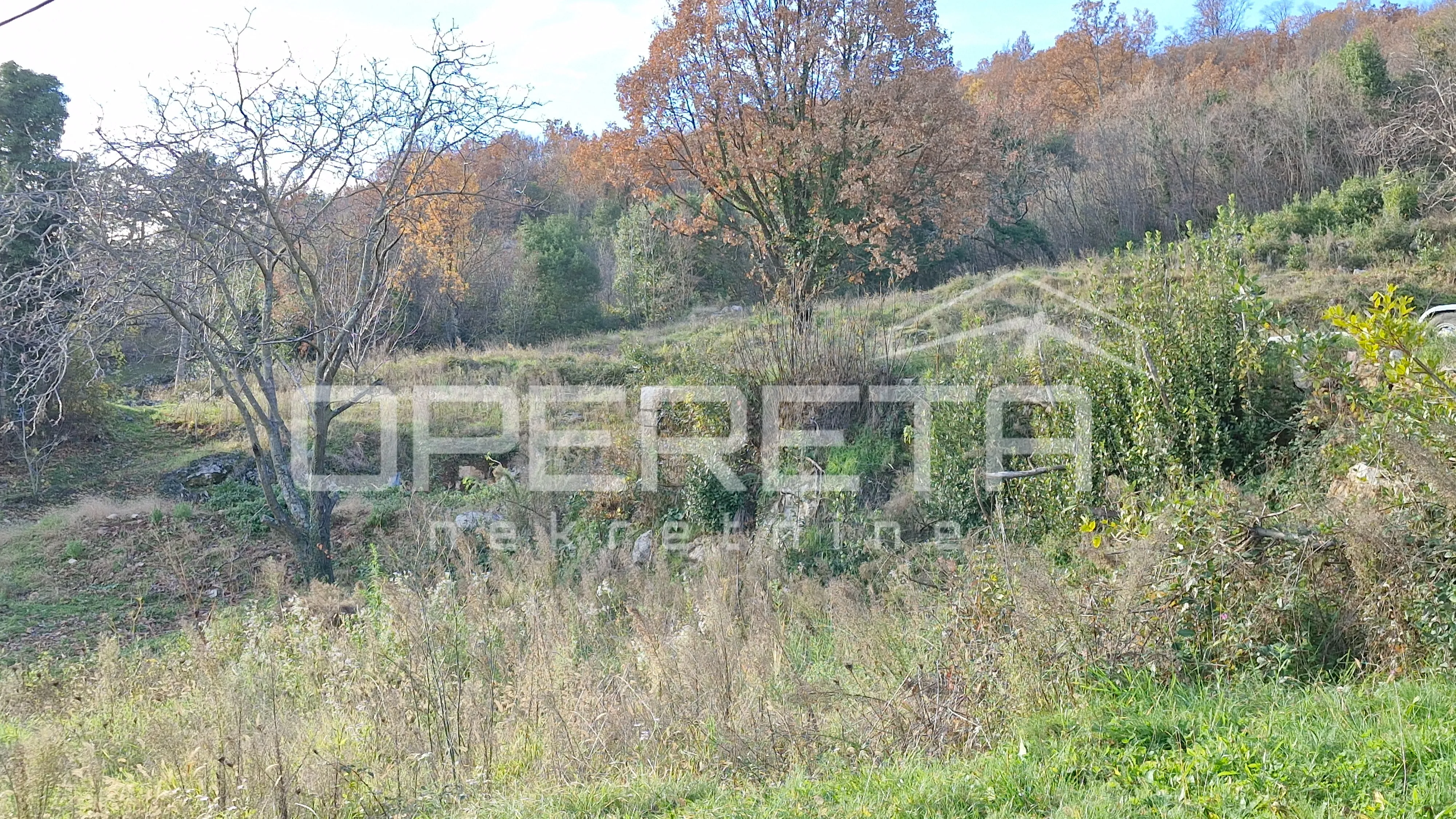 Atraktivno građevinsko zemljište 982 m² s pogledom na more blizu Opatije - cover