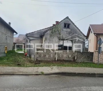 Kuća s okućnicom i dodatnim objektom u mirnom Donjem Kućanu