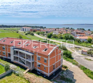 Moderan stan u novogradnji (Medulin) – Prizemlje (60,21 m²) - cover
