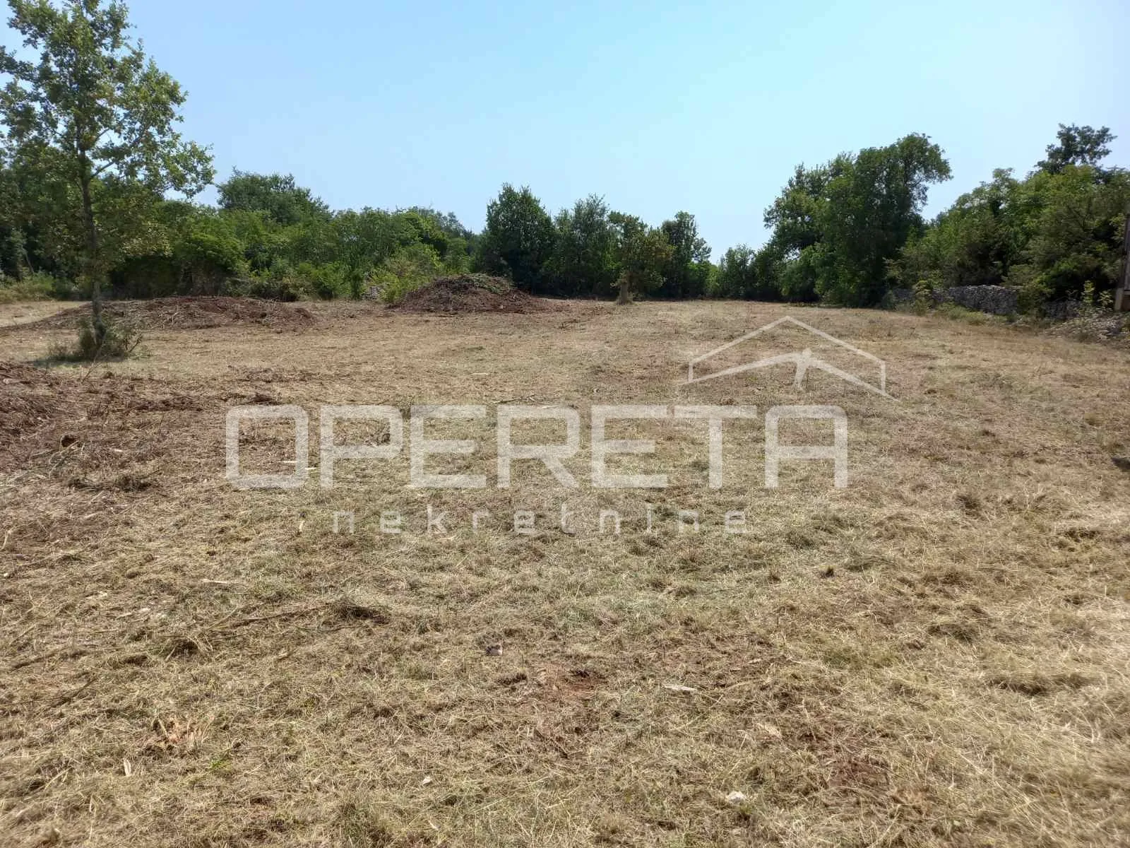 Građevinski teren 380 m² u Pinezićima (struja, voda, uredan put i vlasništvo) - cover