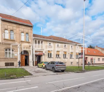 Vrhunska poslovna zgrada u samom centru grada sa noćnim klubom - cover