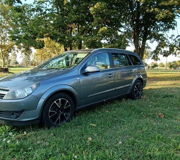 Opel Astra H Karavan - cover