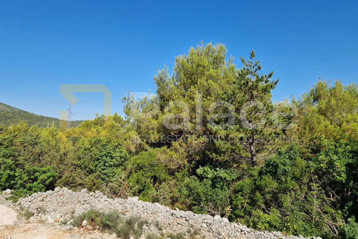 Građevinski teren u mirnom dijelu Bilice s pristupnim putem 1500 m2 - cover